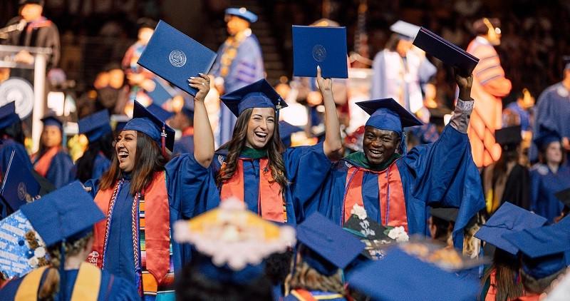 MHA Graduates Celebrating at Commencement